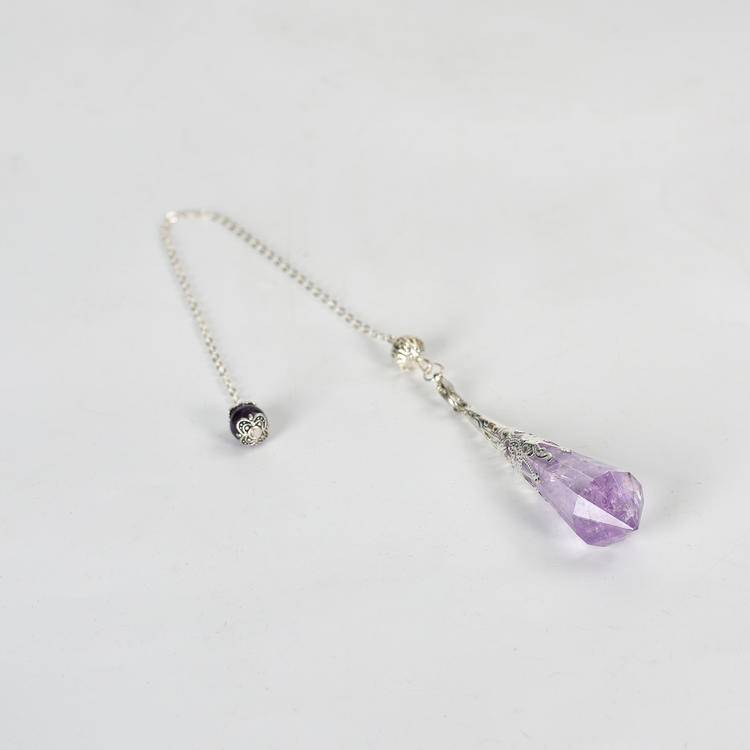 Amethyst Pendulum with deep purple crystals, ideal for spiritual practices and home accents.