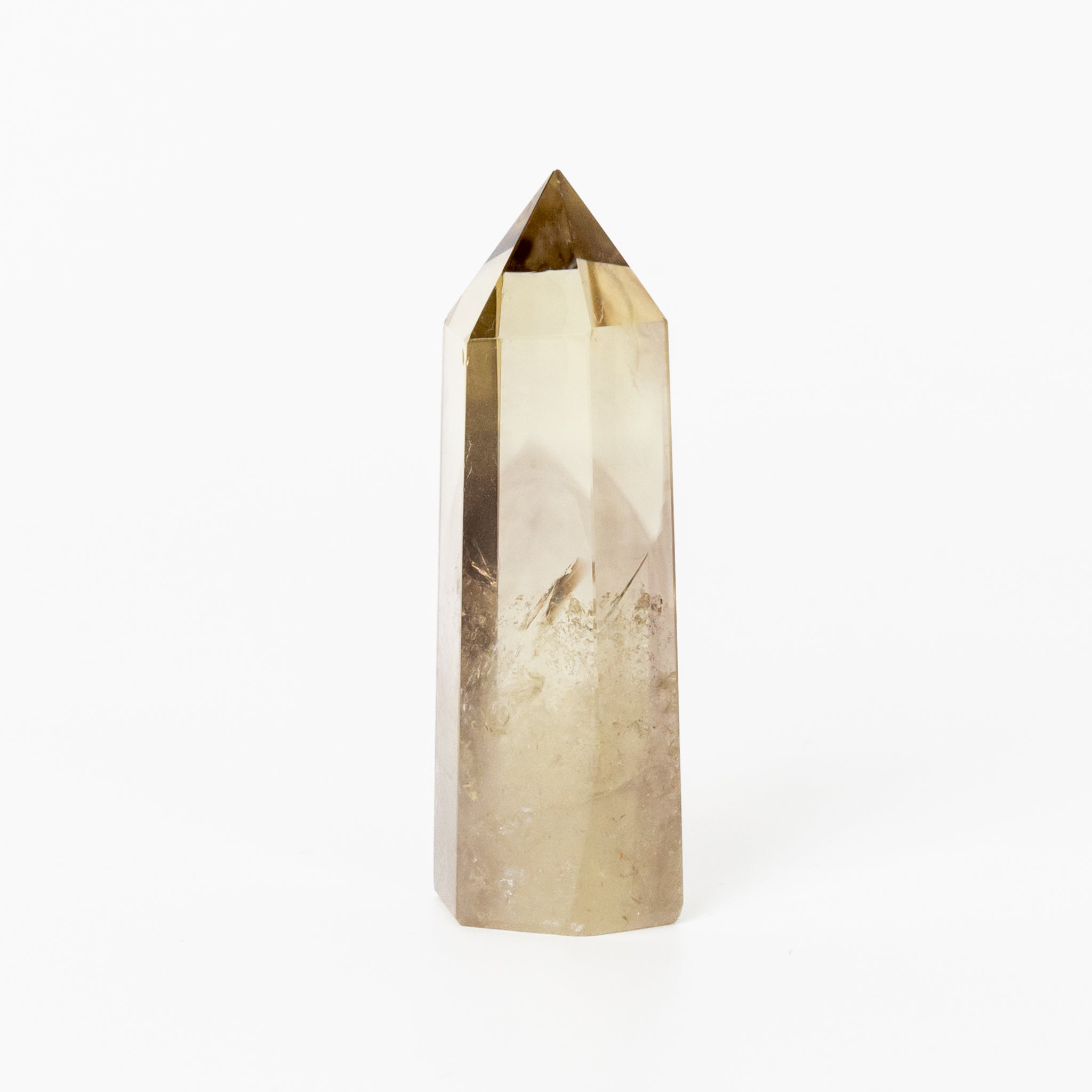 Citrine Obelisk decorative stone with warm yellow tones, adding a sunny glow to home interiors.
