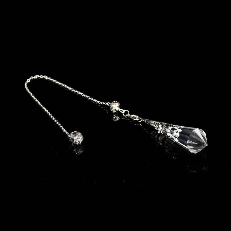 Clear Quartz Pendulum with transparent clarity, ideal for energy work and home decor.