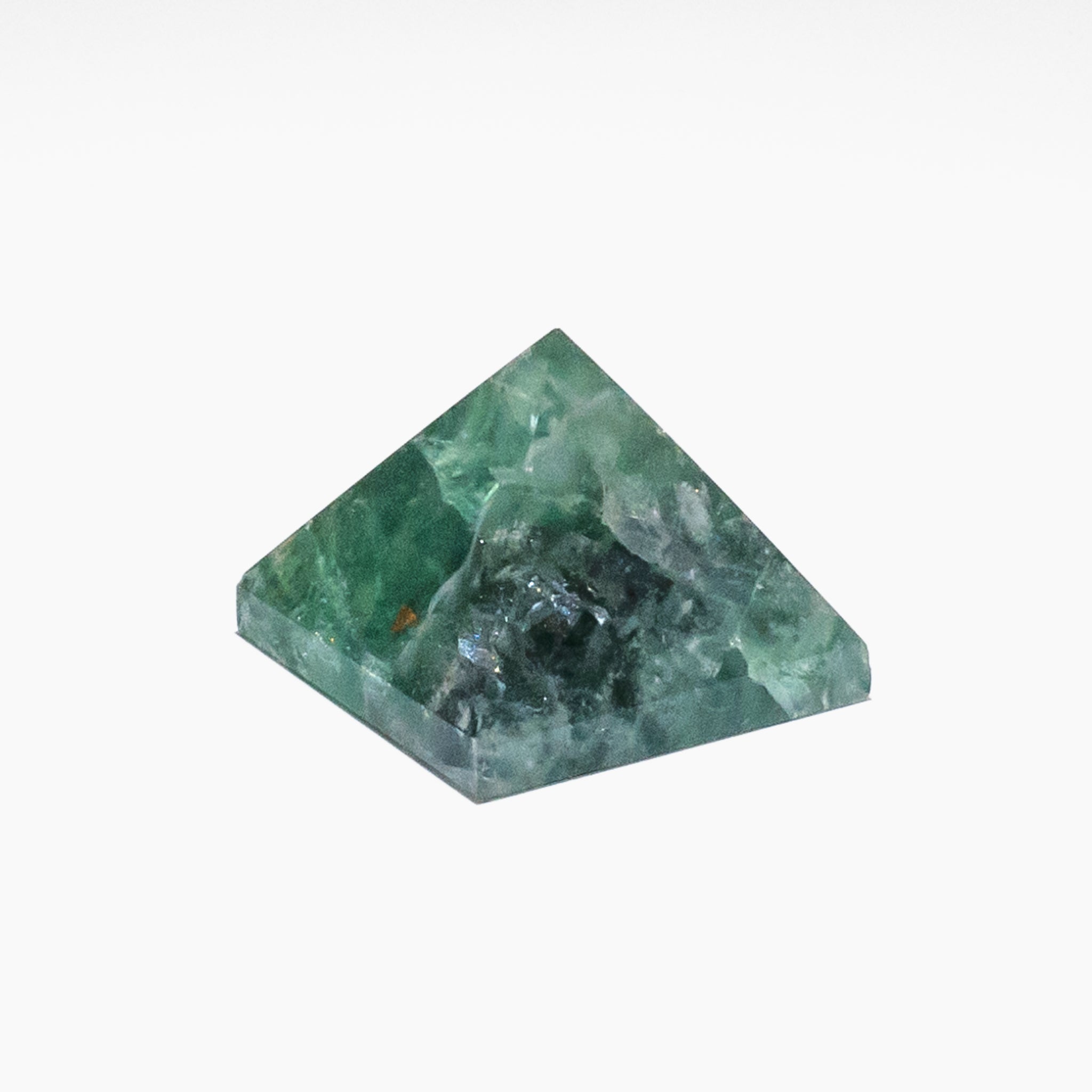 Green Fluorite Pyramid decor piece with vibrant green tones, ideal for refreshing home spaces and energy cleansing.