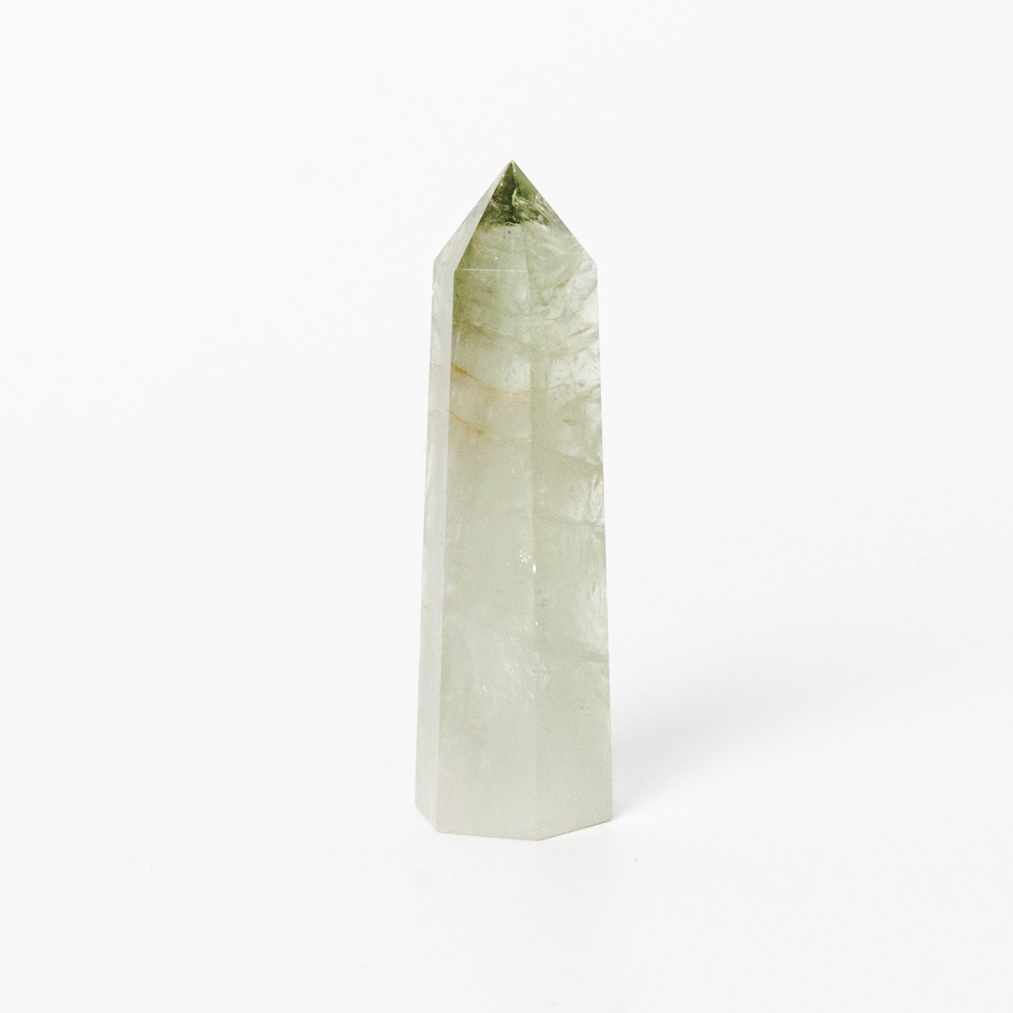 Green Phantom Pyramid ornament with lush green coloring, bringing natural energy to home decor.