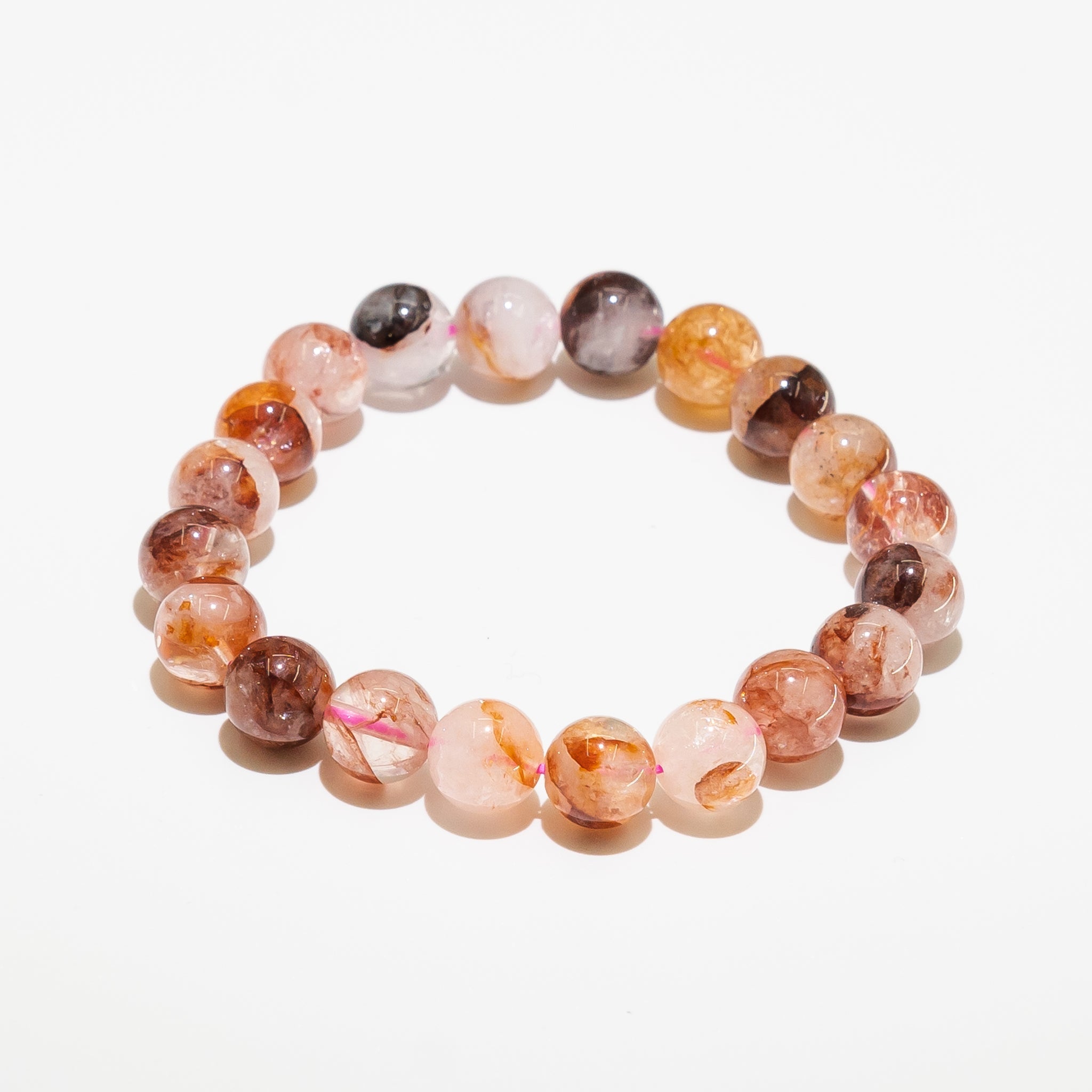 Red Calcite Bracelet 10mm 16cm with vibrant red hues, adding bold energy to daily styling.