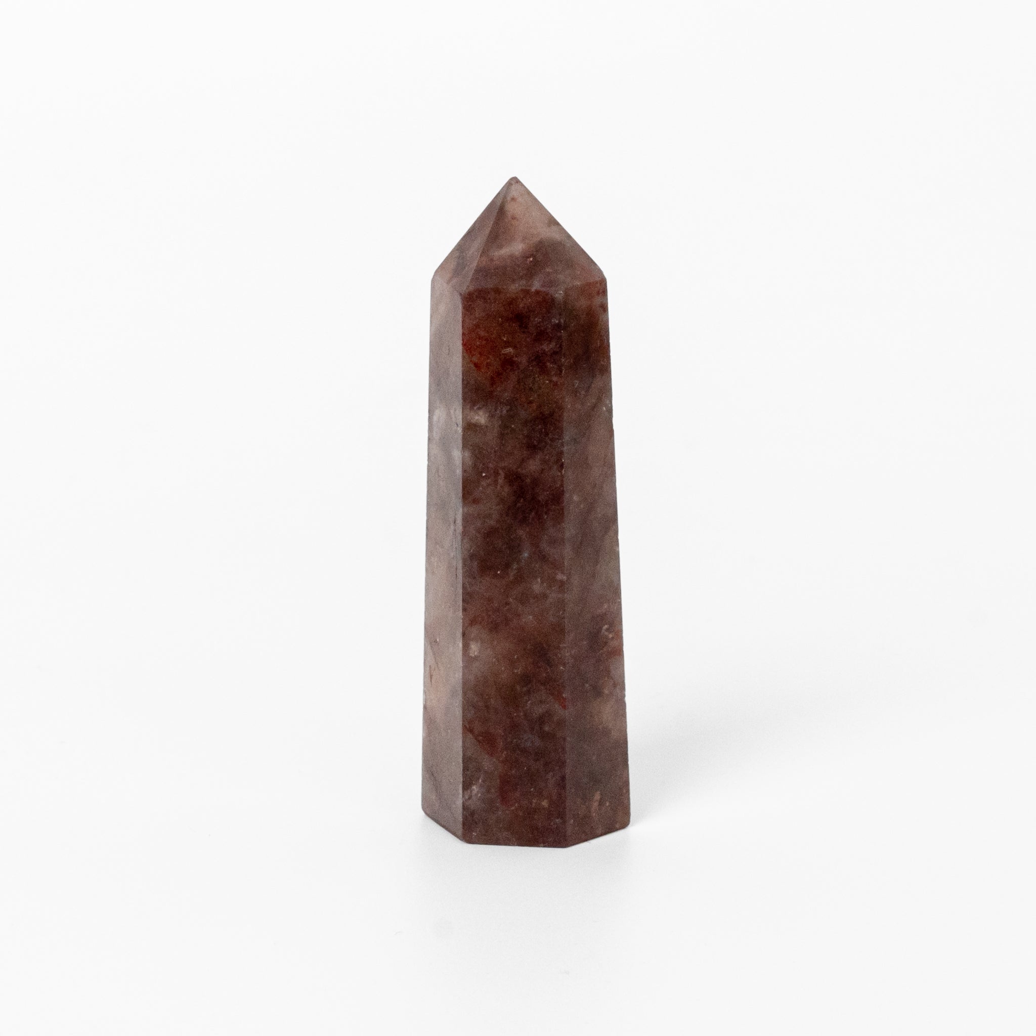 Red Calcite Obelisk decorative stone with vibrant red hues, adding bold energy to home interiors.