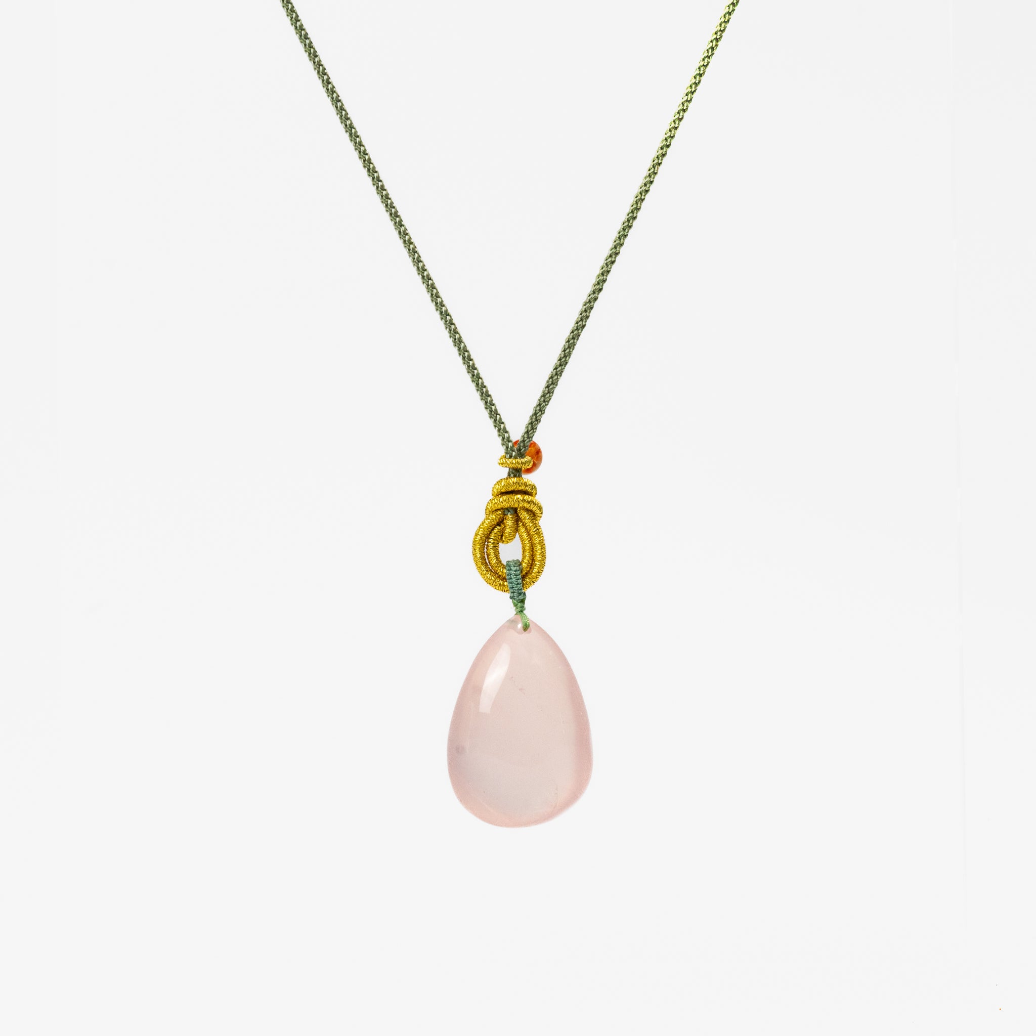 Rose Quartz Necklace with soft pink hues, fostering love and harmony in daily styling.