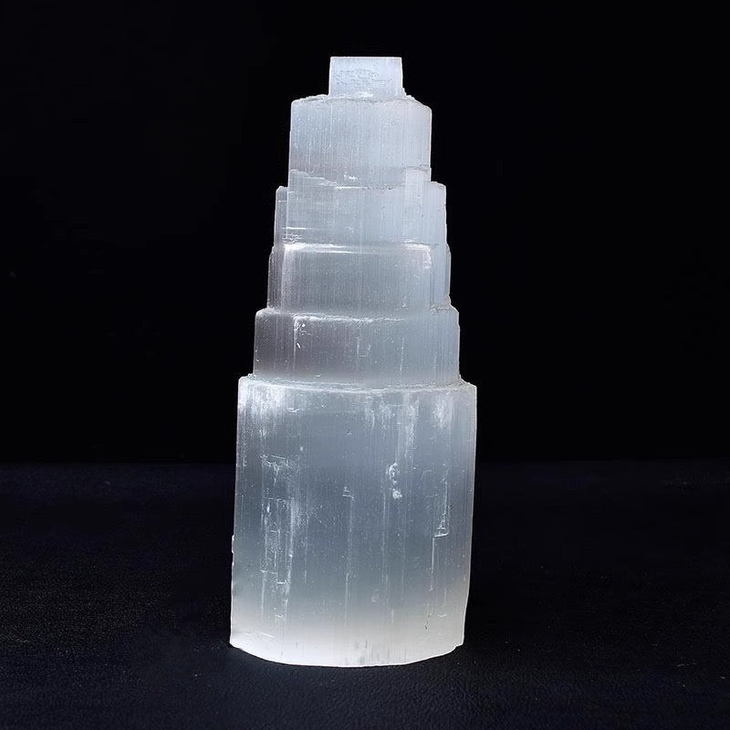 Selenite Tower 10cm for home decor, showcasing white, glowing translucent energy purification.