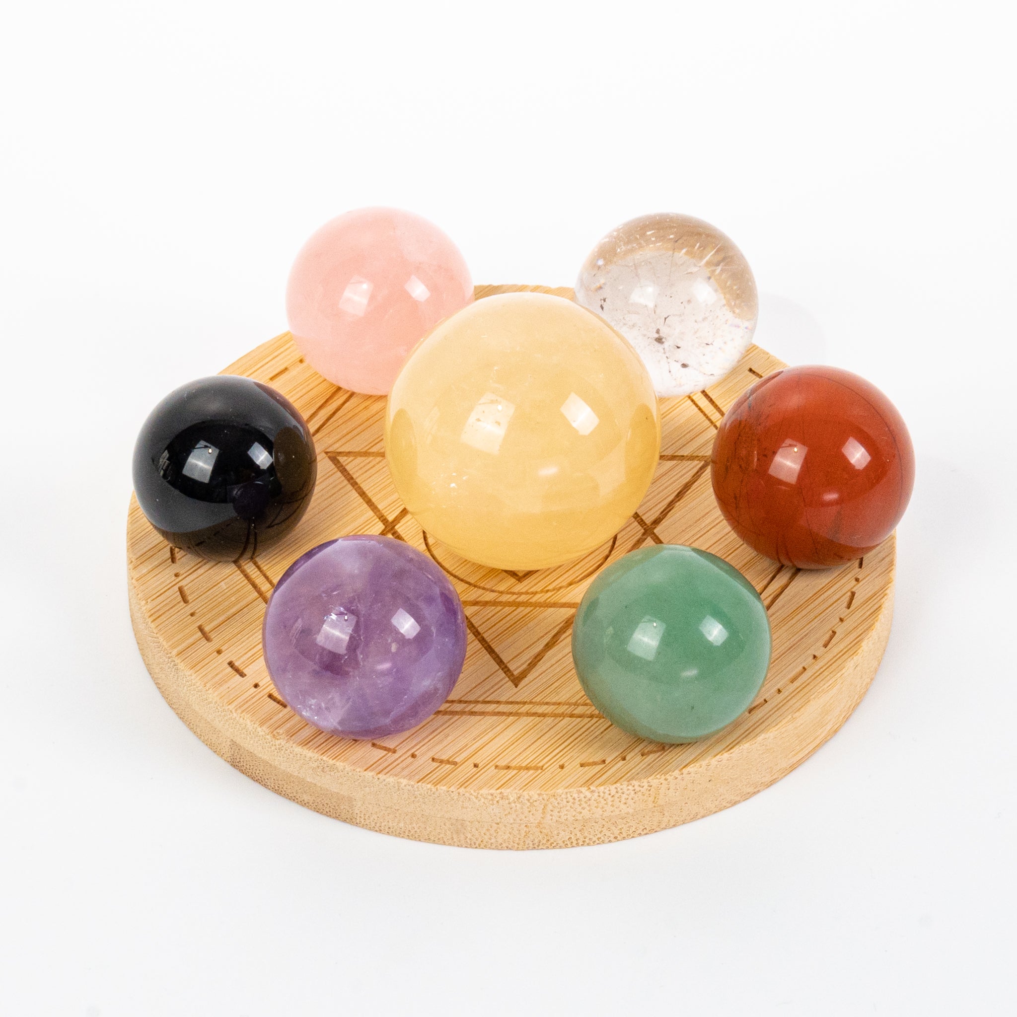 Seven Chakra Crystal Sphere Set 3cm for home decor, aligning energy with colorful chakra stones.