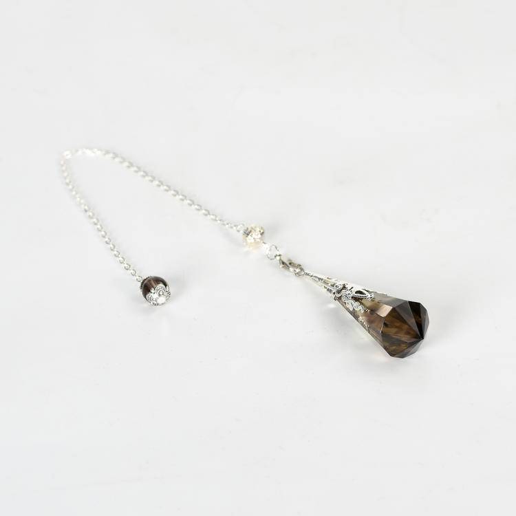 Smoky Quartz Pendulum with smoky brown tones, ideal for grounding energy in spiritual practices.