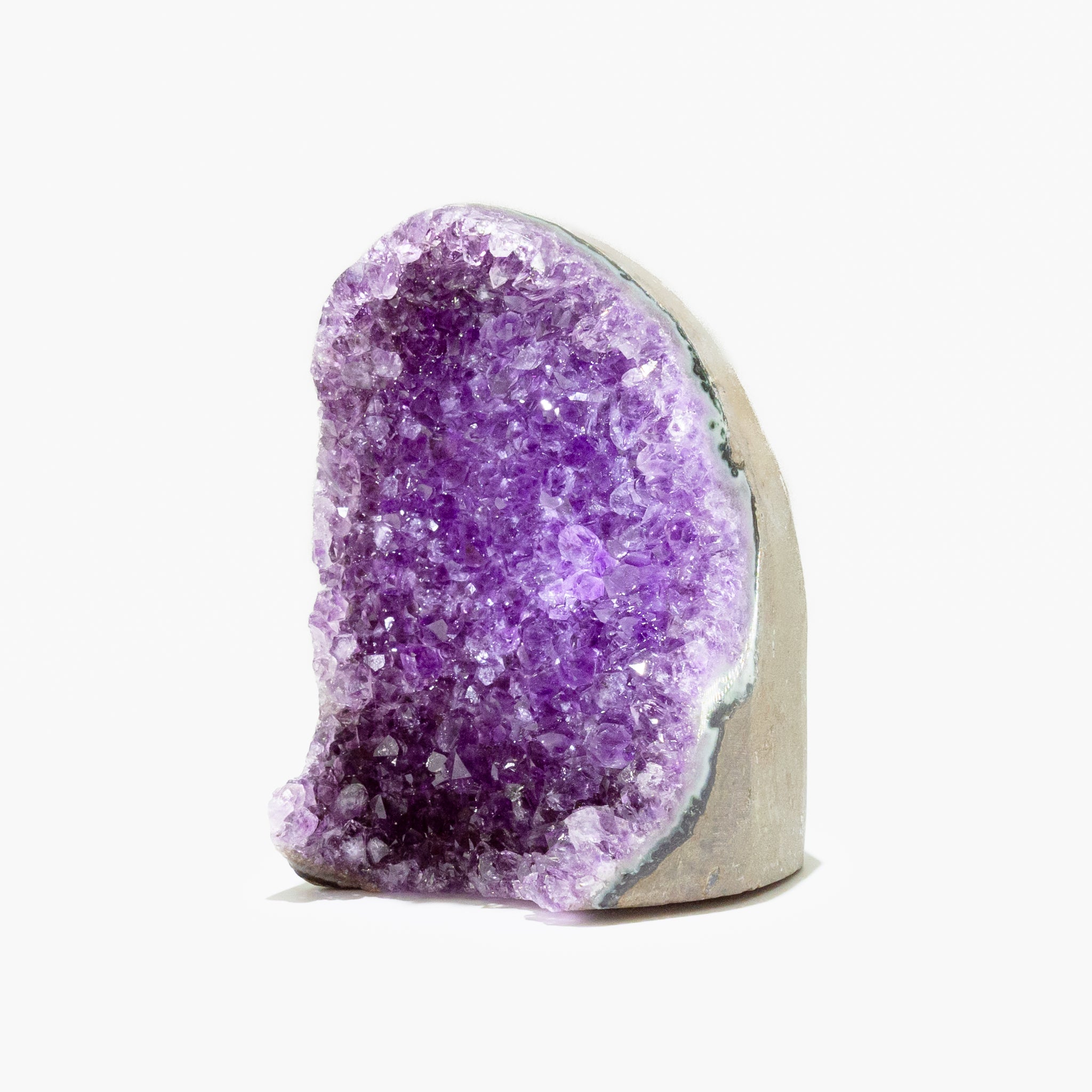 Uruguay Amethyst Geode for home decor, featuring deep purple crystals for elegance and healing.