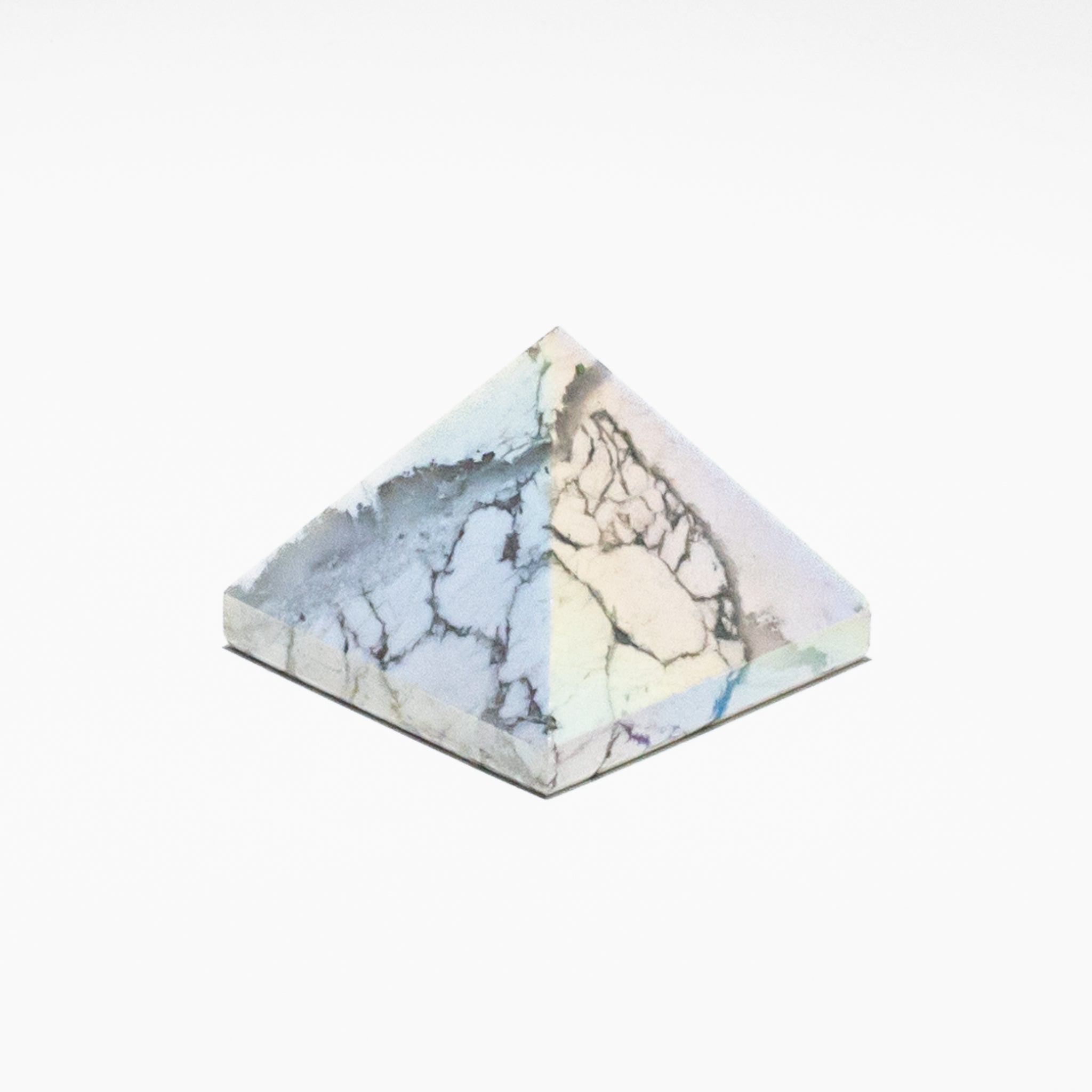 White Turquoise Pyramid decor with creamy white tones and natural veining for serene spaces.