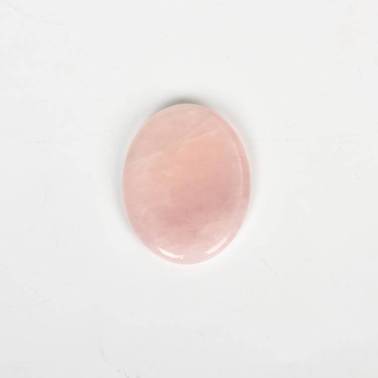 Rose Quartz Worry Stone with soft pink hues, fostering love and calm in daily use.