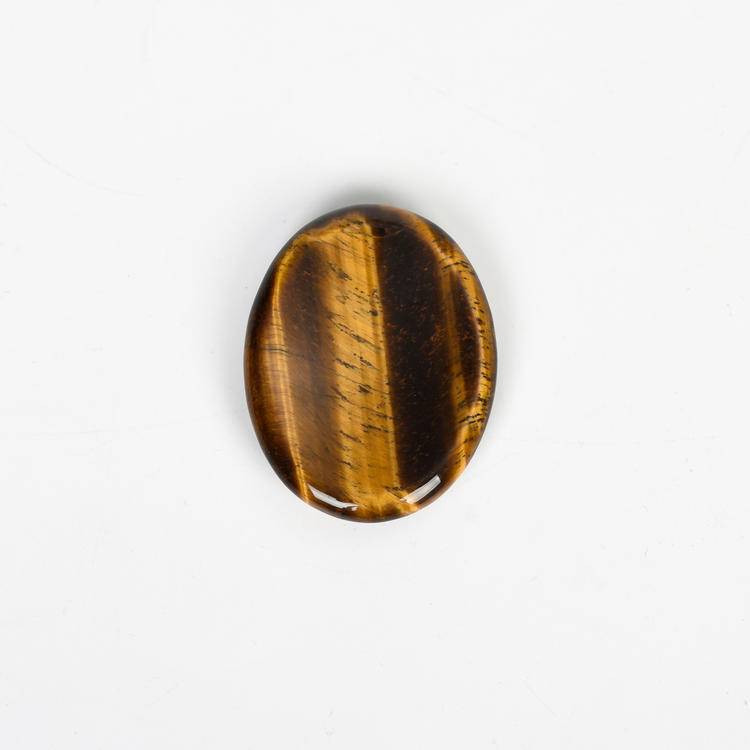 Tiger Eye Worry Stone with golden-brown stripes, perfect for protective energy and stress relief.