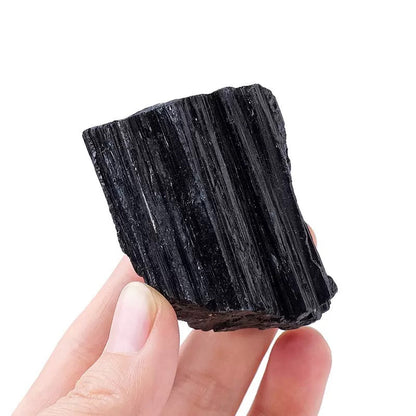 Black Tourmaline Raw Chunk for home decor, showcasing deep black hues for protective energy.