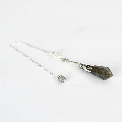 Labradorite Pendulum with iridescent blue and green flashes, perfect for mystical home vibes.