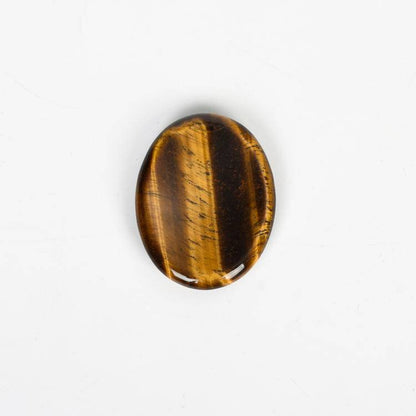 Tiger Eye Worry Stone with golden-brown stripes, perfect for protective energy and stress relief.
